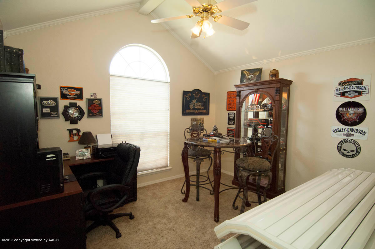5402 Leo Lane Amarillo, TX 79110 - Photo 22 of 37 a workspace with furniture and chandelier