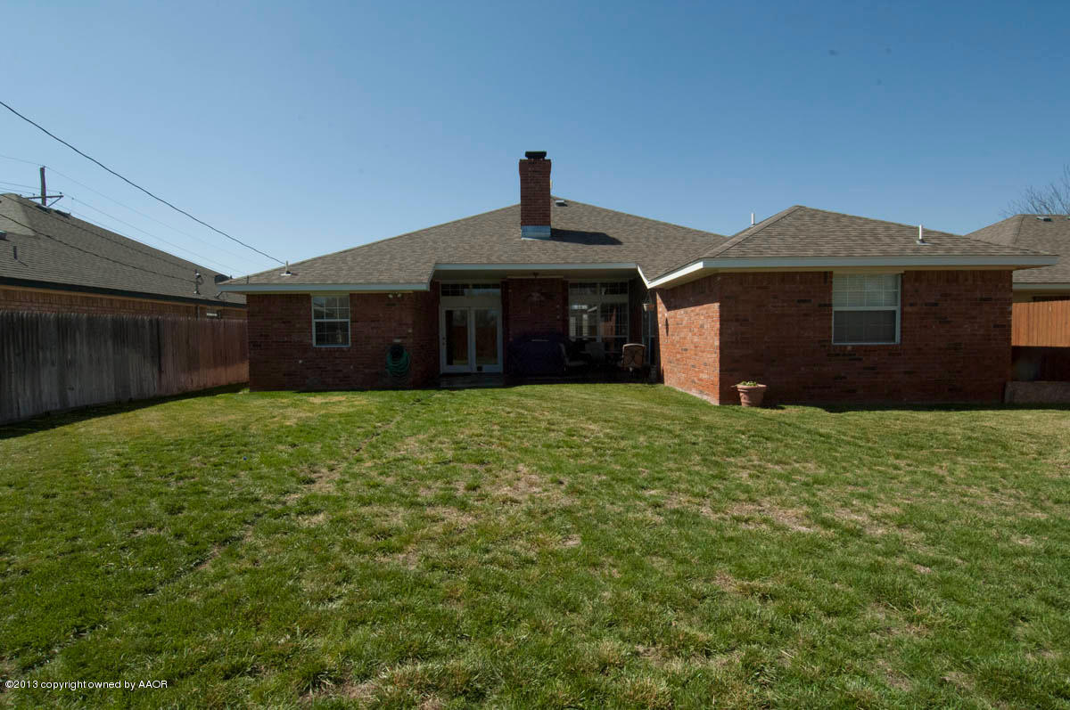 5402 Leo Lane Amarillo, TX 79110 - Photo 34 of 37 a front view of a house with a garden