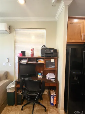 a room with a fireplace and furniture