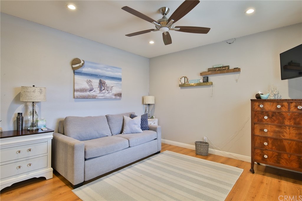 38 Racing Wind Irvine, CA 92614 - Photo 24 of 56 a living room with furniture and a flat screen tv