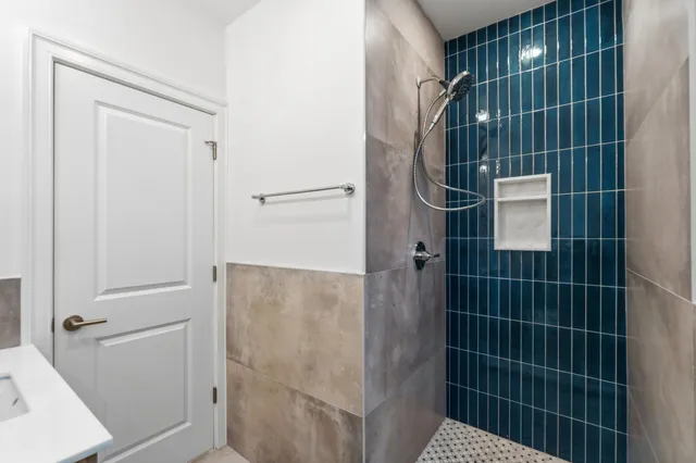 an empty room with large sliding door