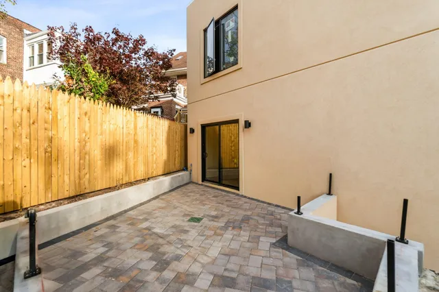 a car parked in front of a house