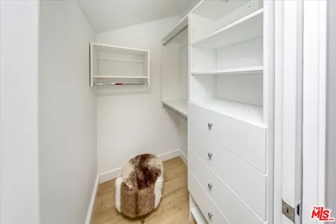 a bathroom with a shower and a toilet