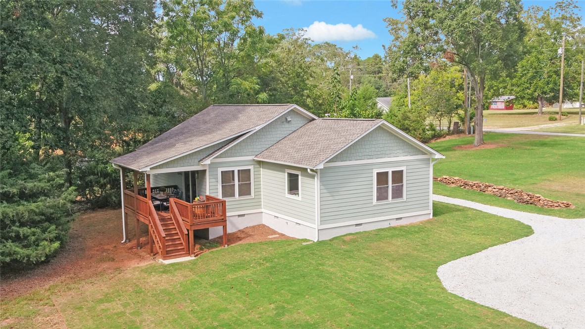 398 Hidden Point Road Hartwell, GA 30643 - Photo 44 of 46 This inviting home offers charming curb appeal and a spacious yard, perfect for outdoor enjoyment.