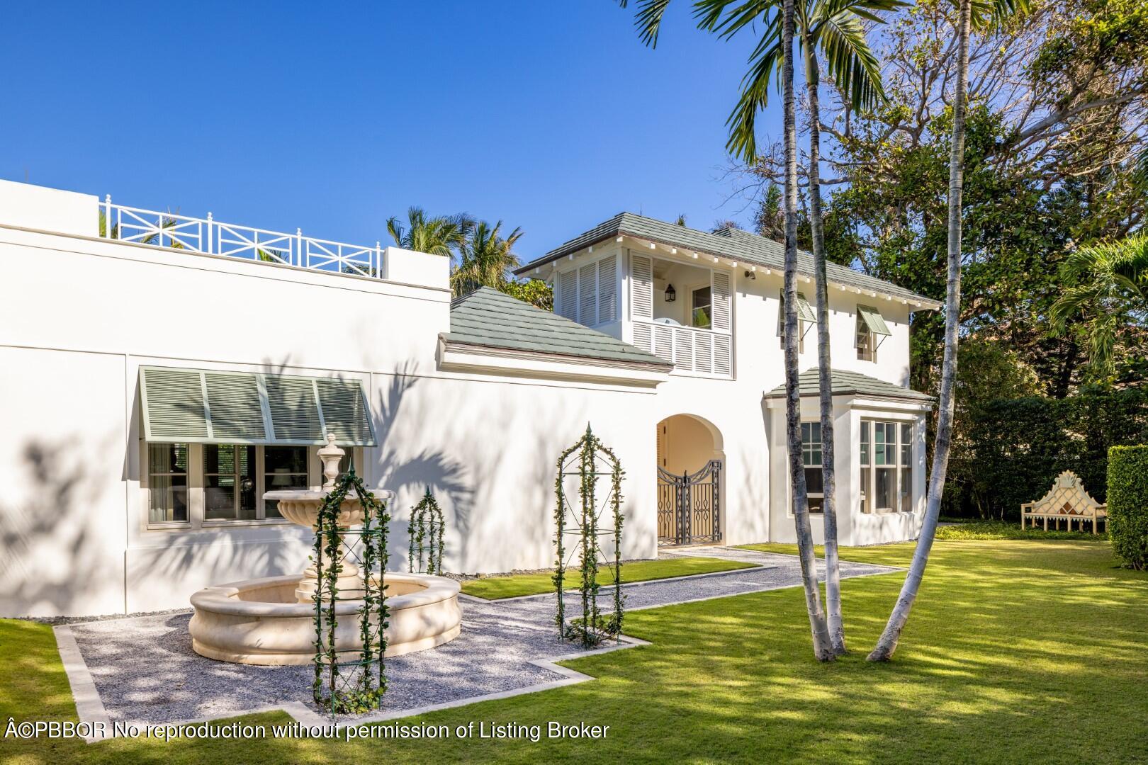 710 South County Road Palm Beach, FL 33480 - Photo 55 of 69 a front view of a house with a yard