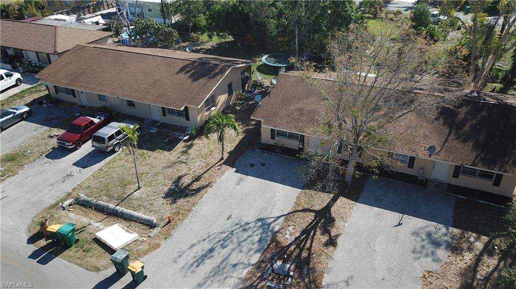 4538 Boabadilla Street Naples, FL 34103 - Photo 4 of 4 an aerial view of a house with a yard