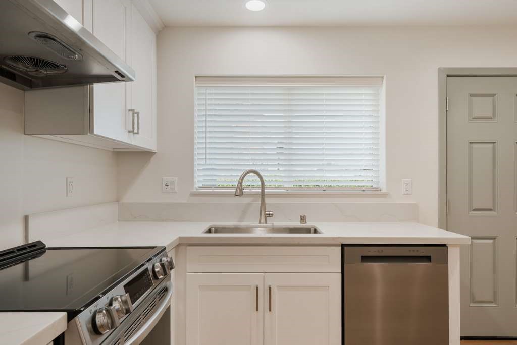 1806 South 8th Street, Unit B Alhambra, CA 91803 - Photo 24 of 44 a kitchen with a sink cabinets and a window