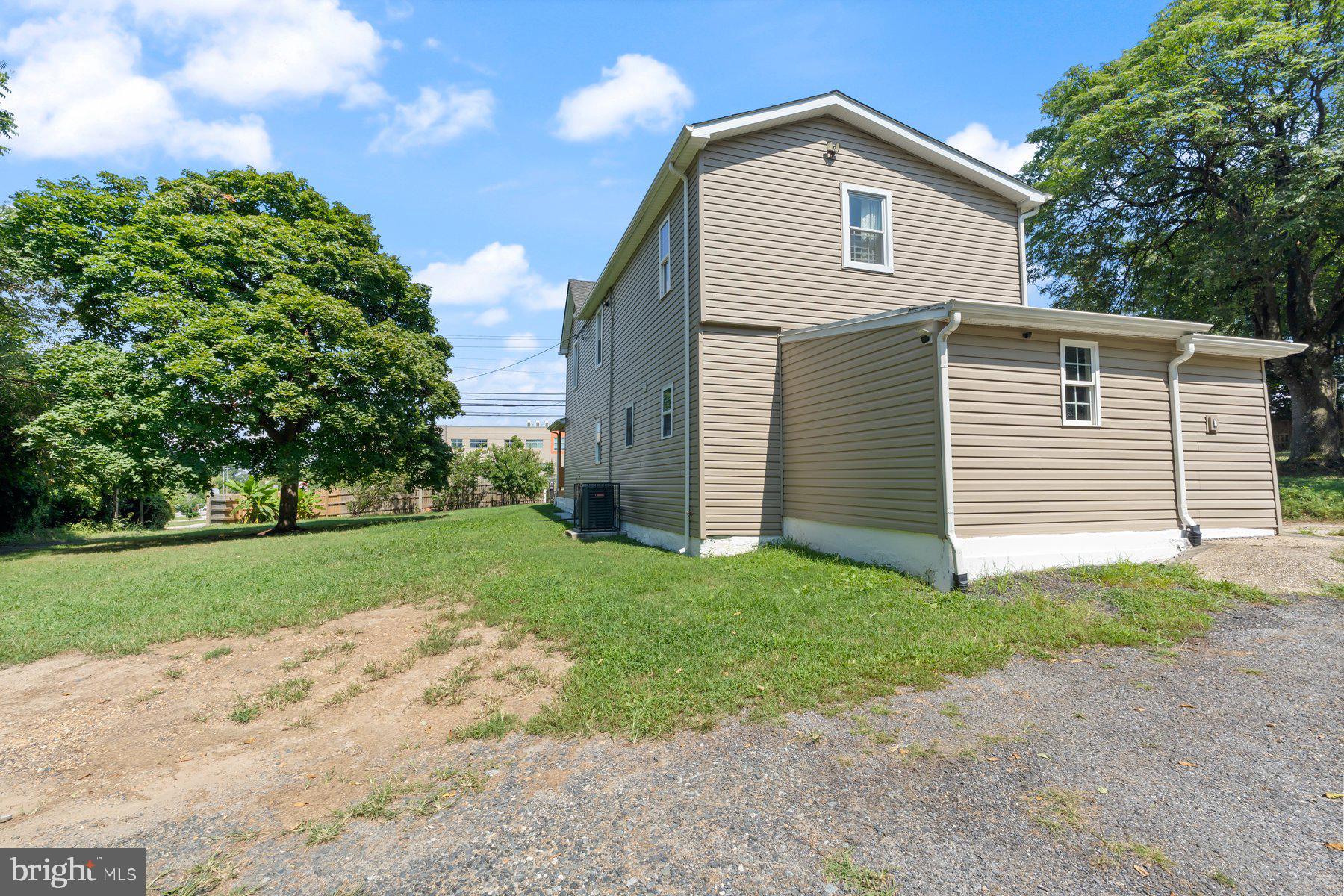 4400 6th Street Baltimore, MD 21225 - Photo 37 of 45 a view of a house with a yard