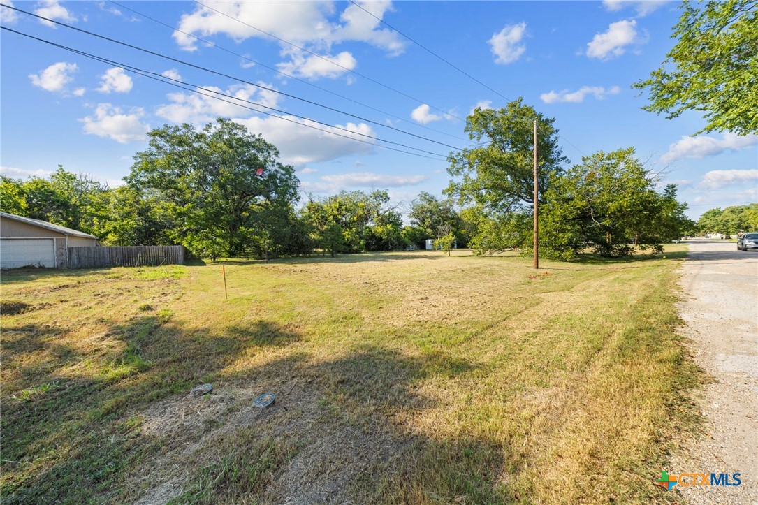 305 South Austin Street Holland, TX 76534 - Photo 6 of 14 a view of yard with swimming pool and outdoor space
