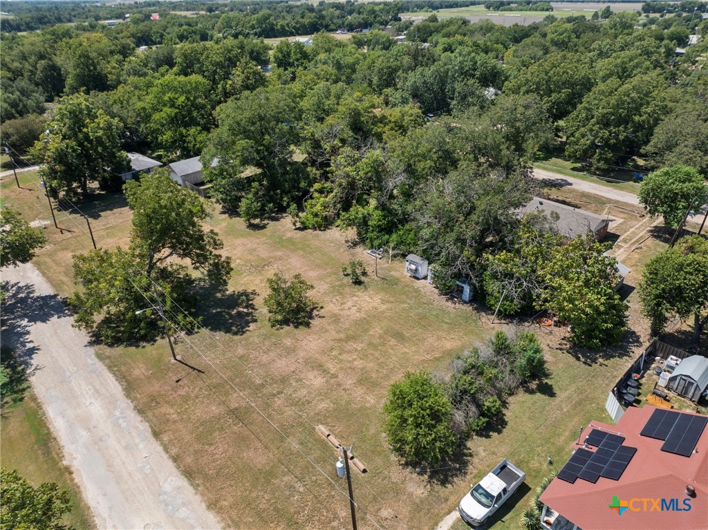 305 South Austin Street Holland, TX 76534 - Photo 9 of 14 an aerial view of a house with a yard