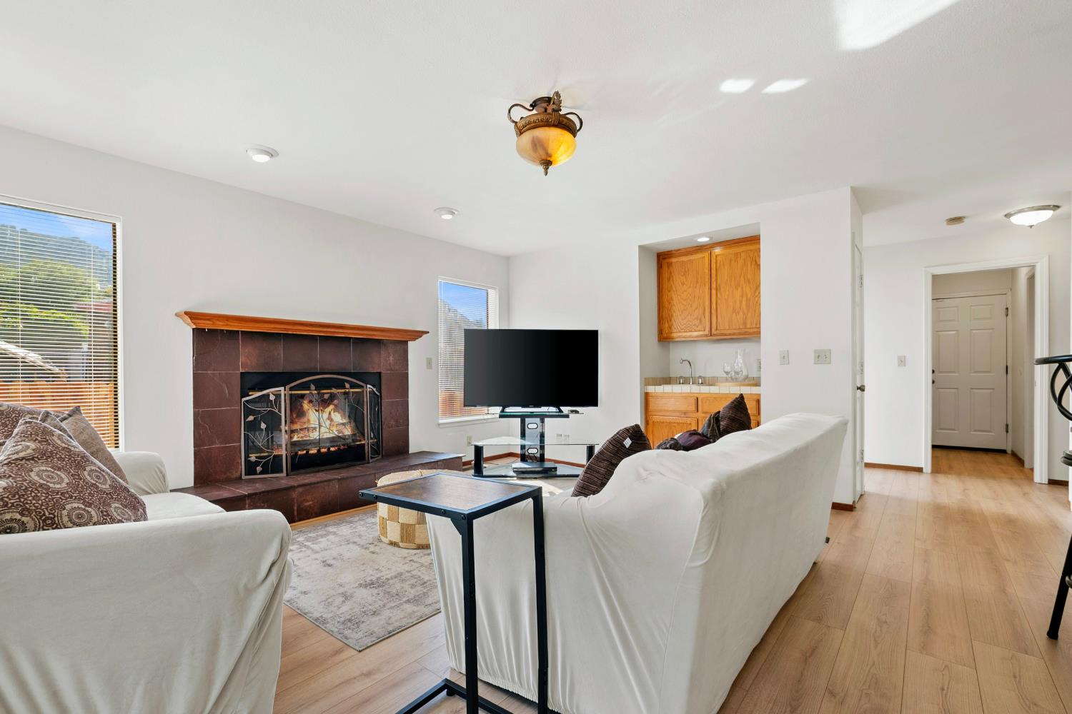 615 Stanley Lane El Sobrante, CA 94803 - Photo 15 of 39 a living room with furniture and a flat screen tv