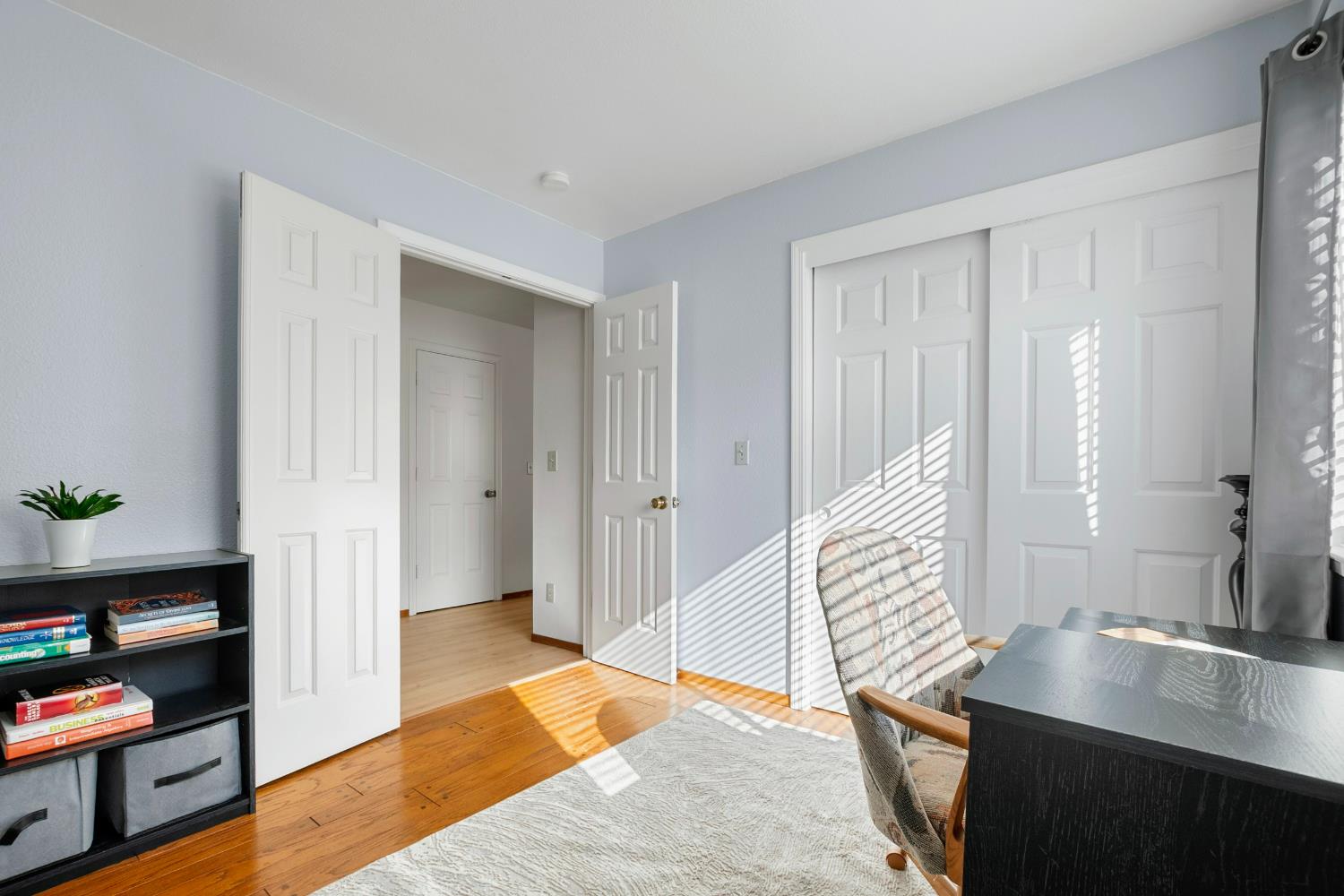 615 Stanley Lane El Sobrante, CA 94803 - Photo 18 of 39 a view of a room with wooden floor and furniture
