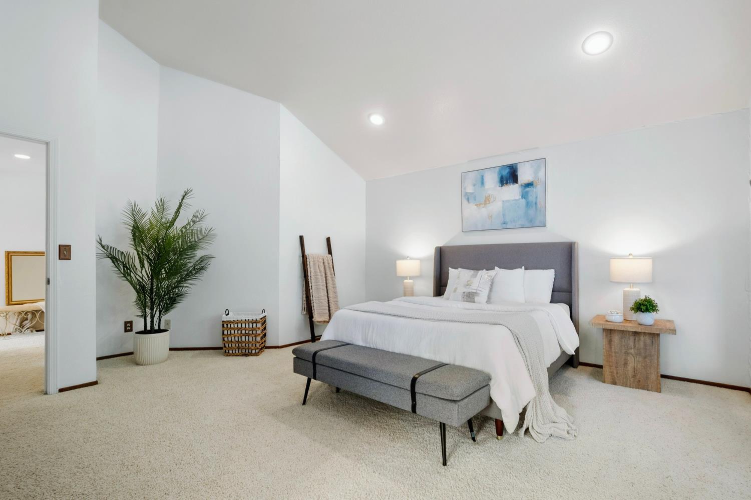 615 Stanley Lane El Sobrante, CA 94803 - Photo 23 of 39 a bedroom with a bed and a potted plant