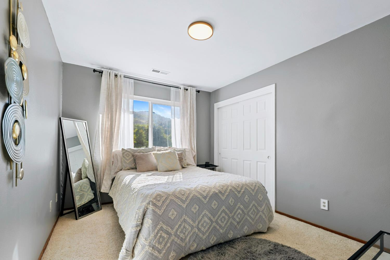 615 Stanley Lane El Sobrante, CA 94803 - Photo 30 of 39 a bedroom with a bed and a window