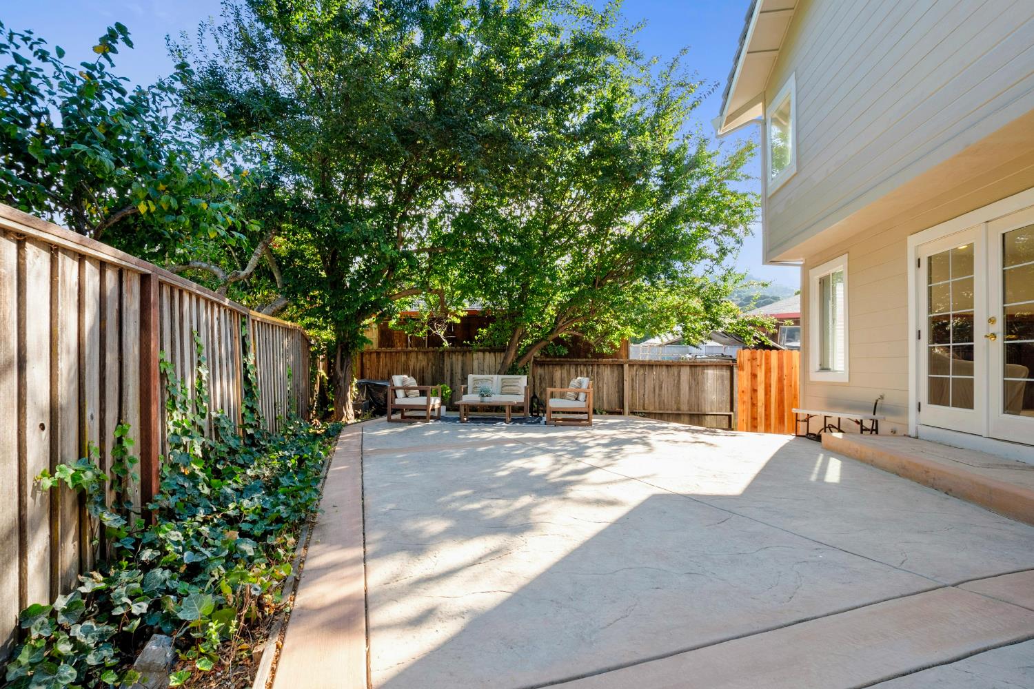 615 Stanley Lane El Sobrante, CA 94803 - Photo 34 of 39 a view of backyard of house with yard and outdoor seating