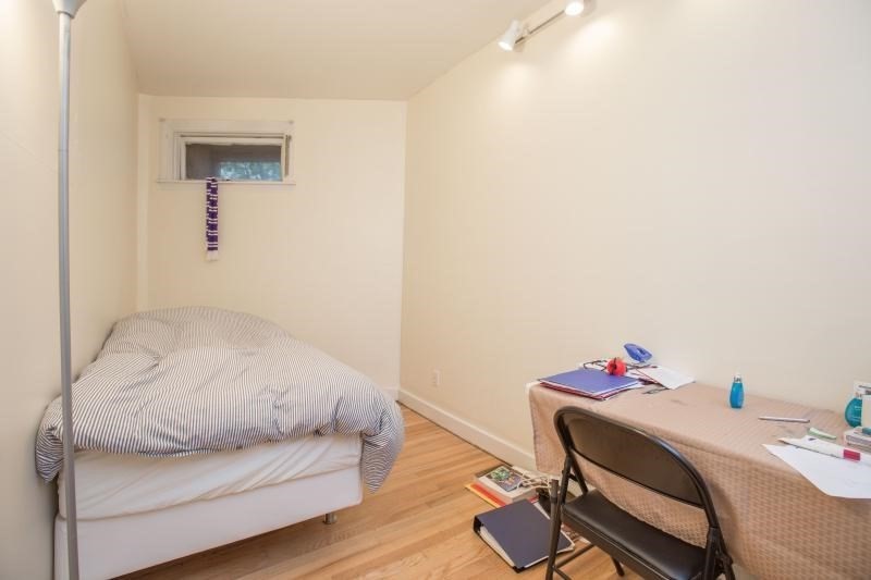 290 Commonwealth Avenue, Unit A Boston, MA 02115 - Photo 12 of 21 a bedroom with a bed and a wooden floor