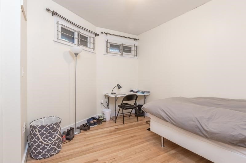 290 Commonwealth Avenue, Unit A Boston, MA 02115 - Photo 14 of 21 a bedroom with a bed and a table