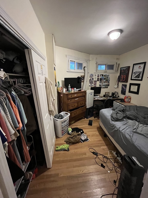 290 Commonwealth Avenue, Unit A Boston, MA 02115 - Photo 19 of 21 a living room with furniture and a flat screen tv