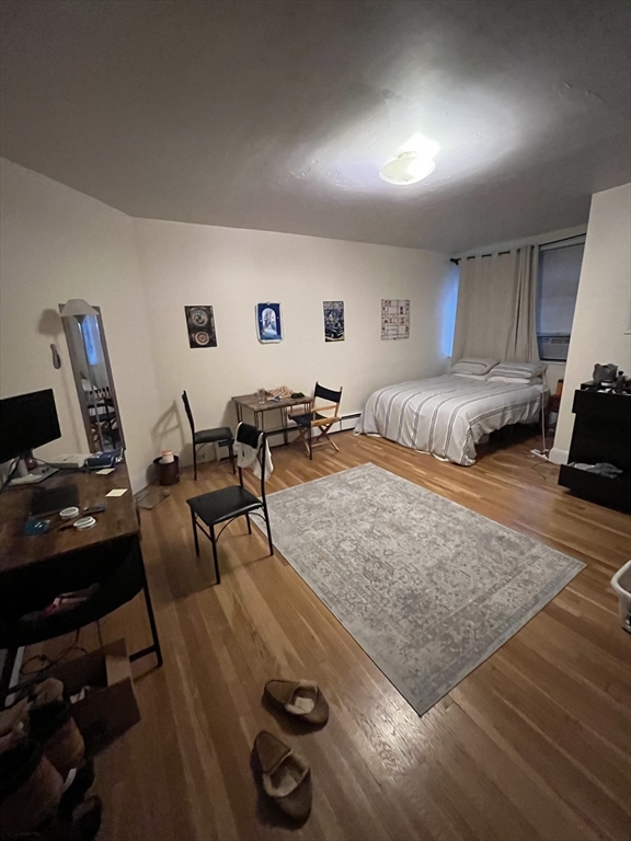 290 Commonwealth Avenue, Unit A Boston, MA 02115 - Photo 9 of 21 a living room with furniture