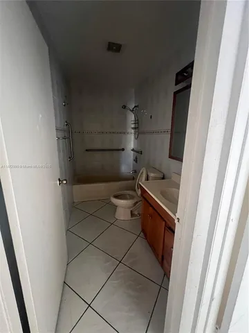 a bathroom with a sink and washing machine