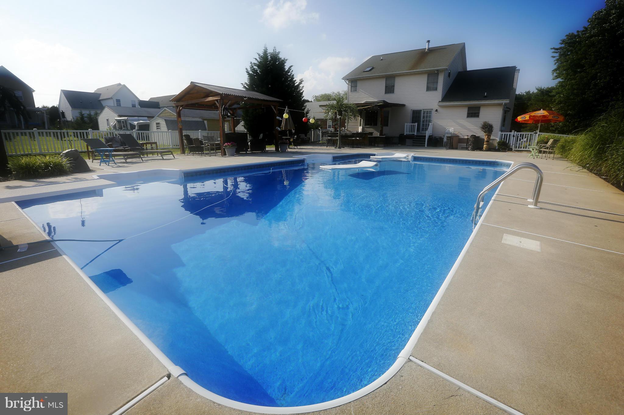 4609 Forge Road Perry Hall, MD 21128 - Photo 3 of 30 a view of a swimming pool with a patio