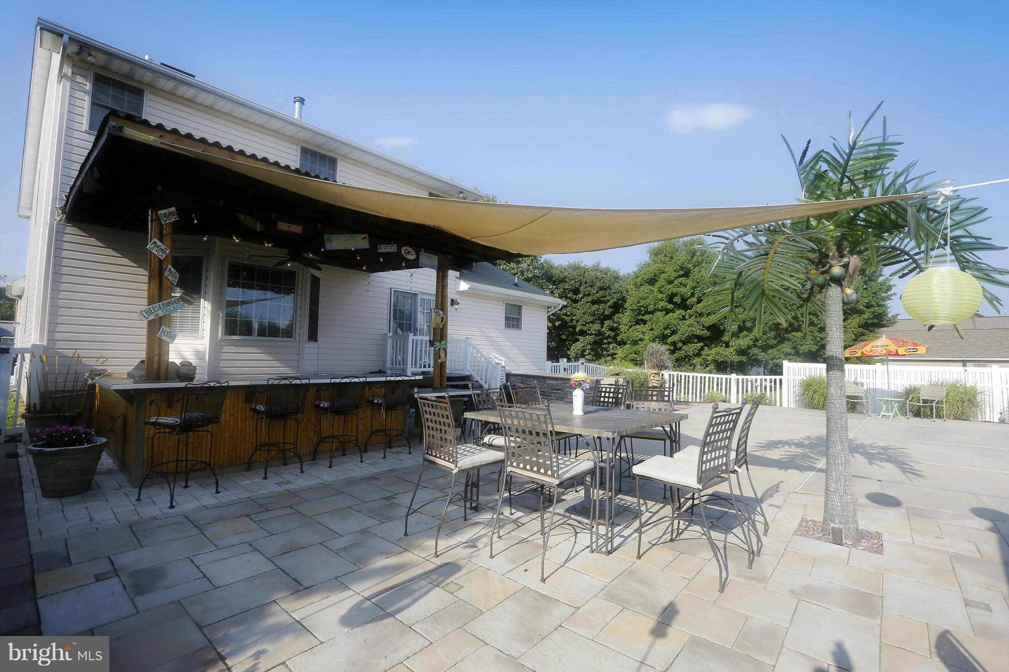 4609 Forge Road Perry Hall, MD 21128 - Photo 5 of 30 a view of backyard with outdoor seating and plants