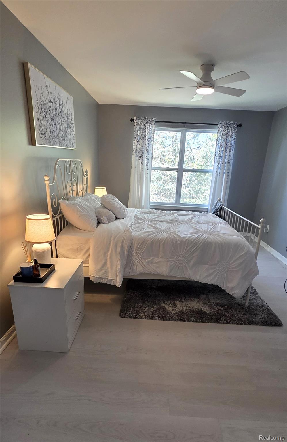 814 Nelson's Ridge Drive Howell, MI 48843 - Photo 13 of 40 Master Bedroom with a ceiling fan and wood finished floors
