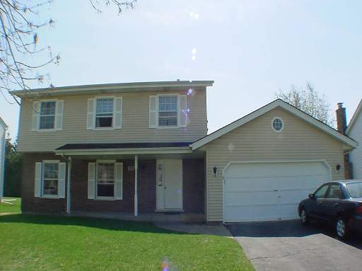 1178 Redfield Road Naperville, IL 60563 - Photo 1 of 1 a front view of a house with a garden