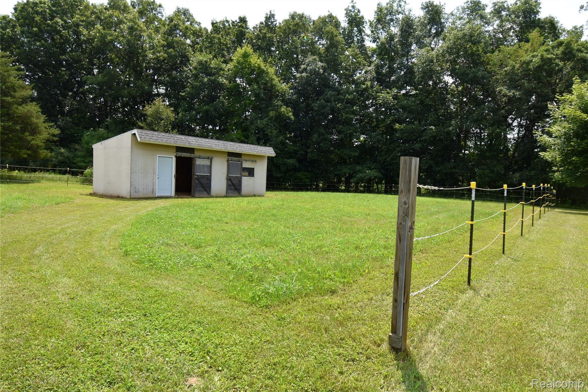 6747 Pinckney Road Pinckney, MI 48169 - Photo 38 of 44 35 HORSE BARN.JPG