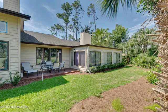 a view of a house with a swimming pool