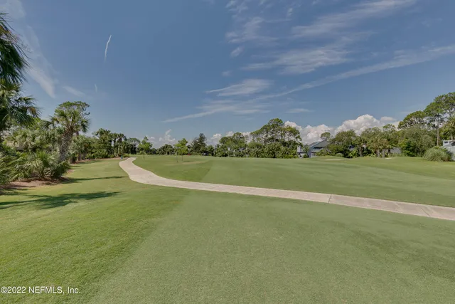 a view of a trees in front of a house