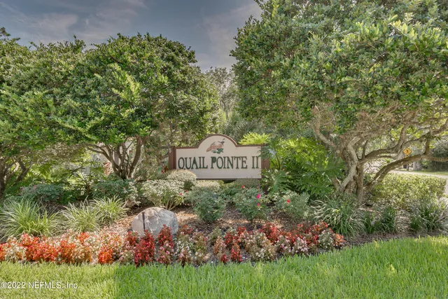 a view of lake with green space
