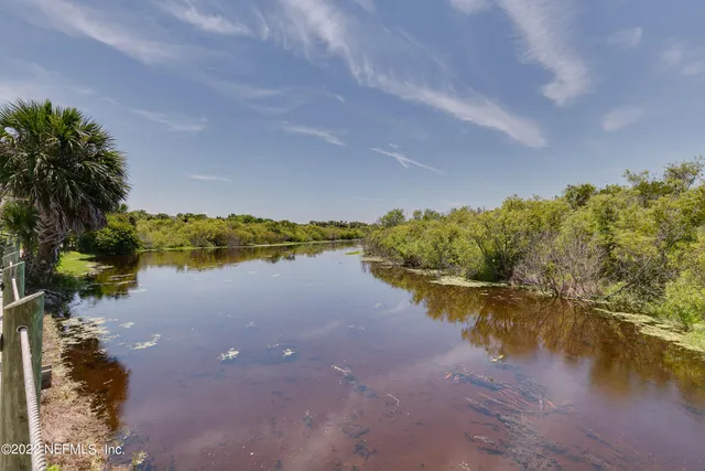 a view of a lake with a mountain in the background
