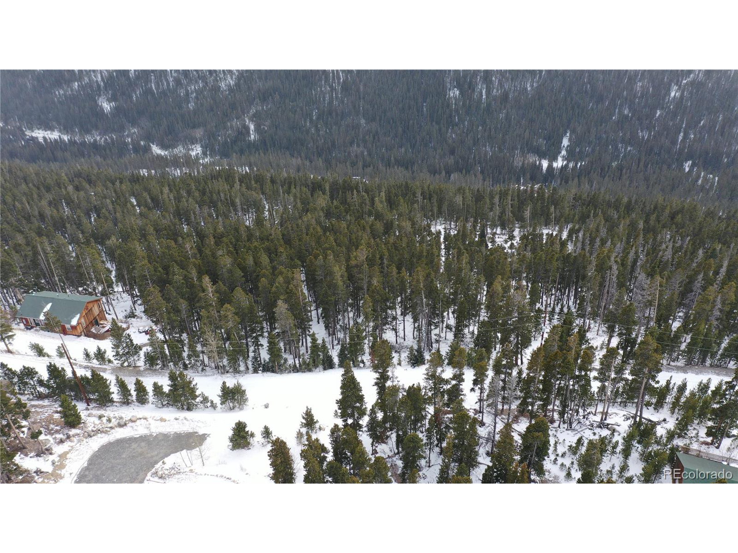 37 Vista Road Idaho Springs, CO 80452 - Photo 1 of 27 a black and white photo of a house