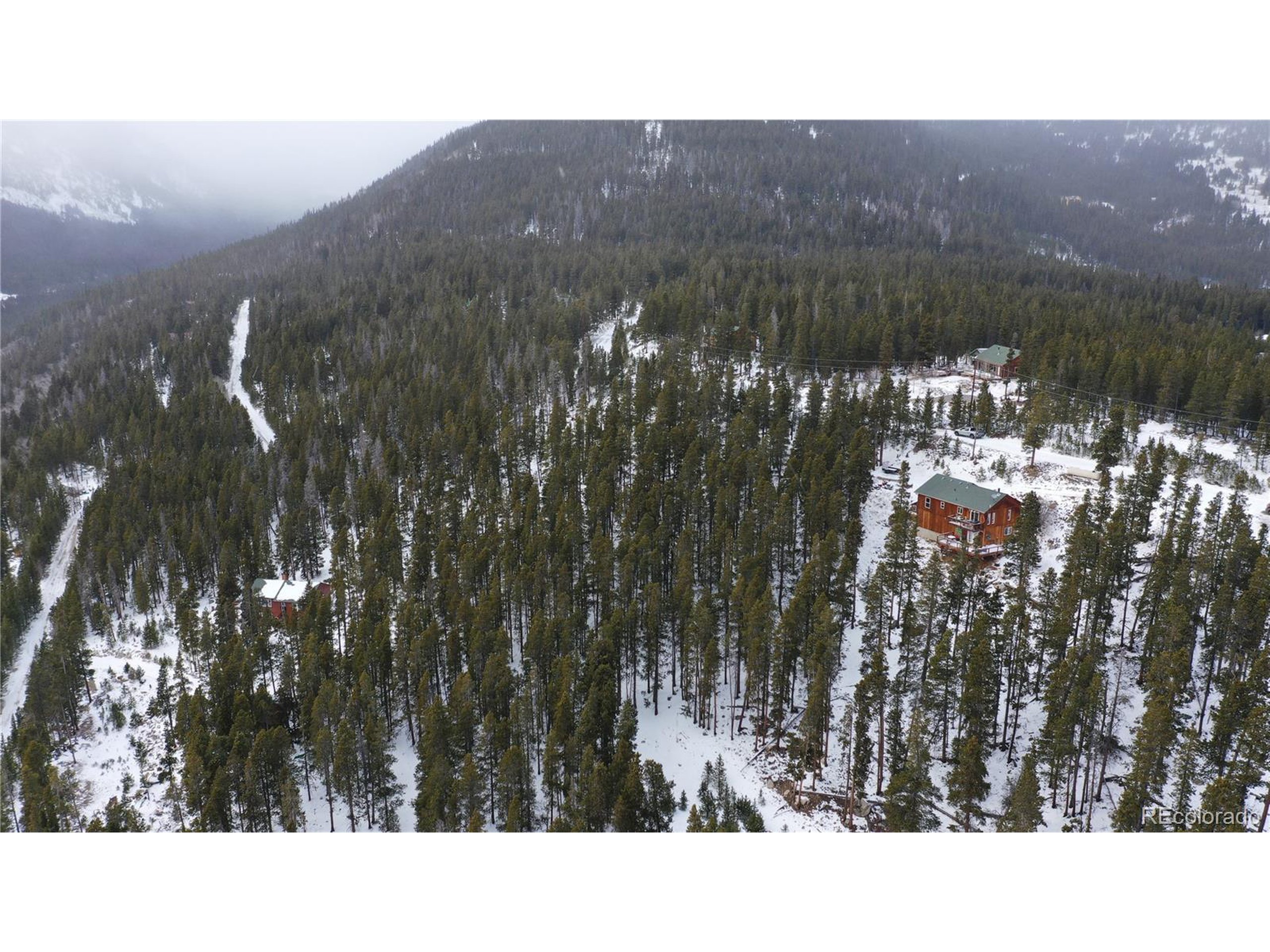 37 Vista Road Idaho Springs, CO 80452 - Photo 15 of 27 a black and white photo of a lake