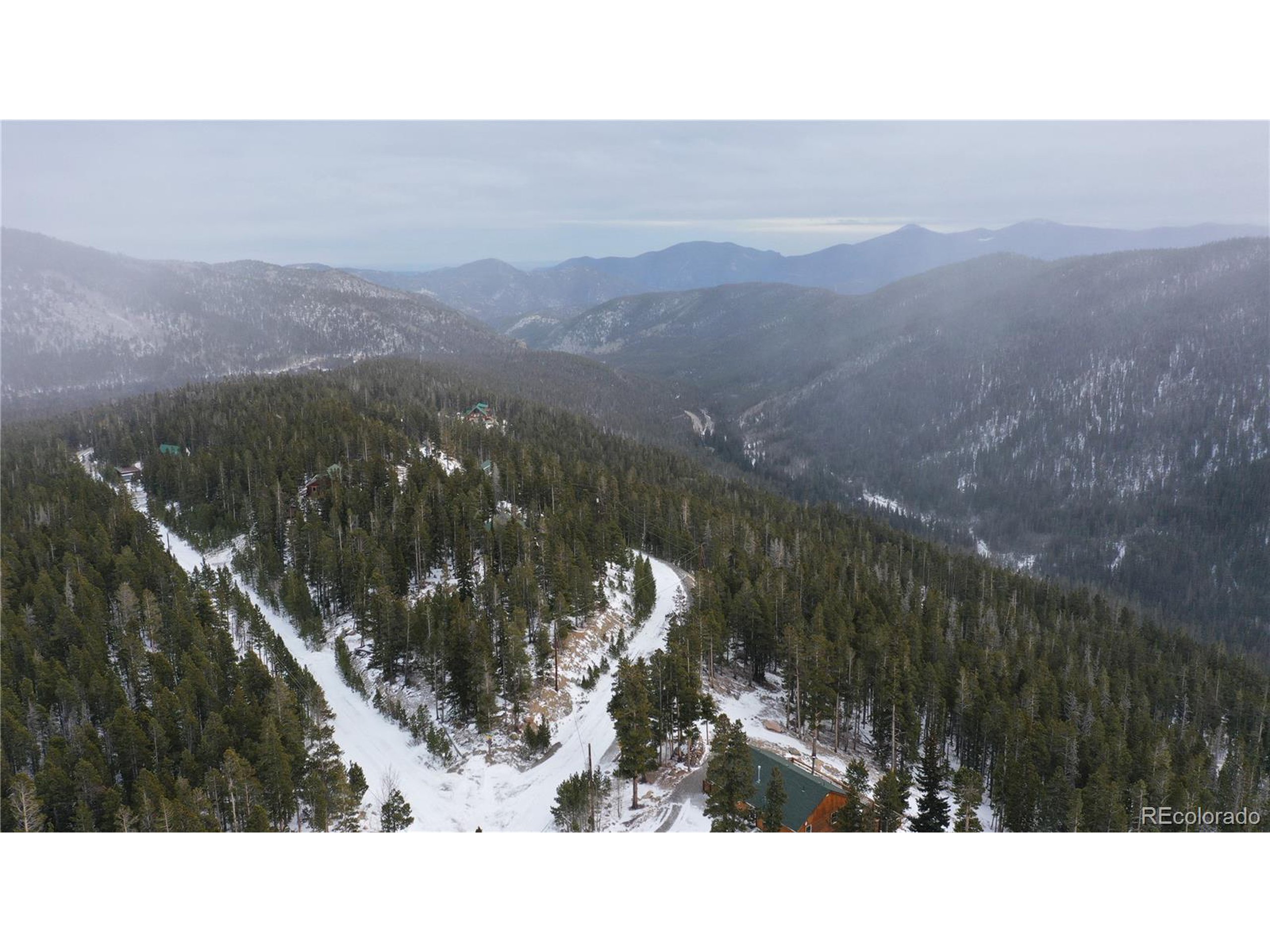 37 Vista Road Idaho Springs, CO 80452 - Photo 21 of 27 a black and white photo of a mountain