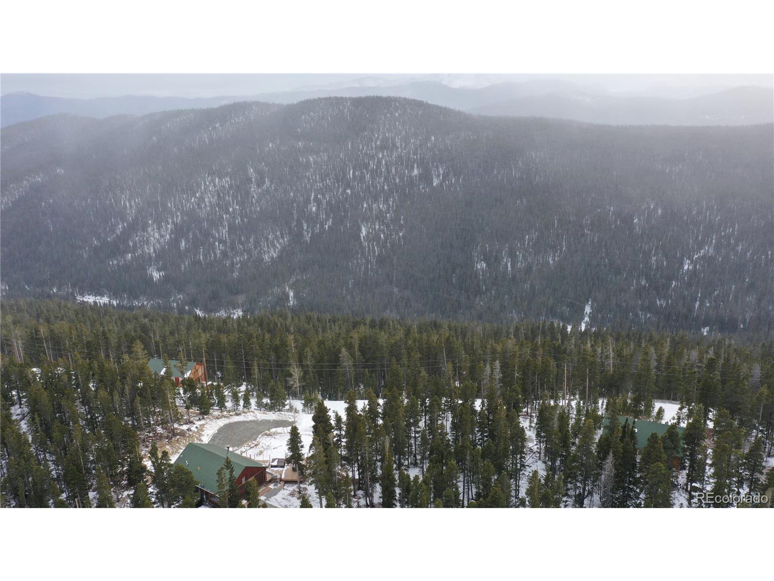 37 Vista Road Idaho Springs, CO 80452 - Photo 22 of 27 a black and white photo of a lake