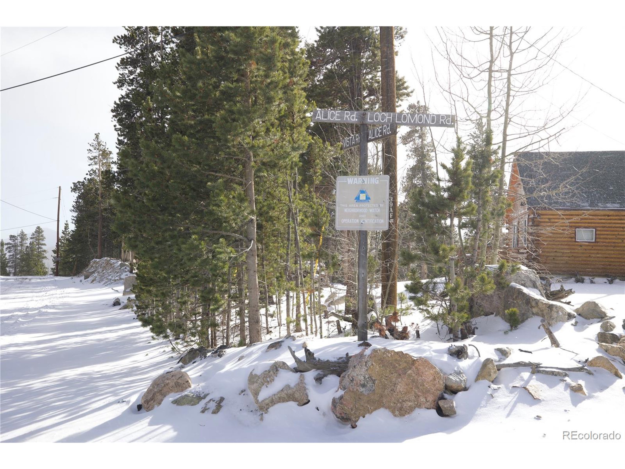 37 Vista Road Idaho Springs, CO 80452 - Photo 27 of 27 a street view with tall buildings