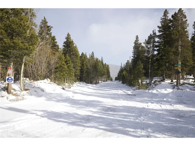 a view of a backyard of the house