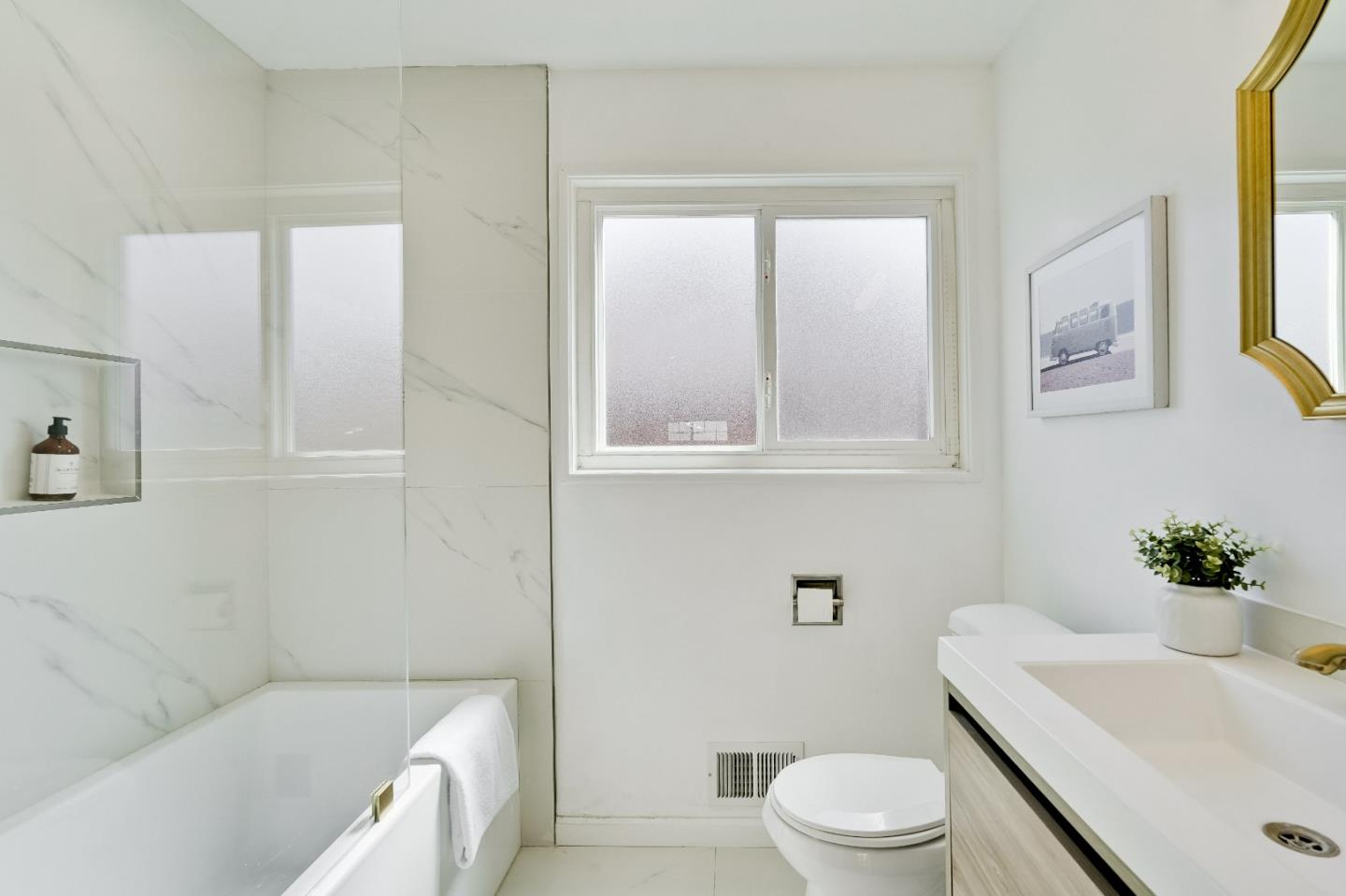1755 Ravizza Avenue Santa Clara, CA 95051 - Photo 26 of 36 a bathroom with a sink a toilet and tub