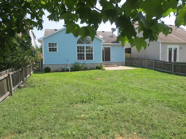 113 Pleasant Ridge Way Lexington, KY 40509 - Photo 2 of 37 Back of home shows the fence and fairly
