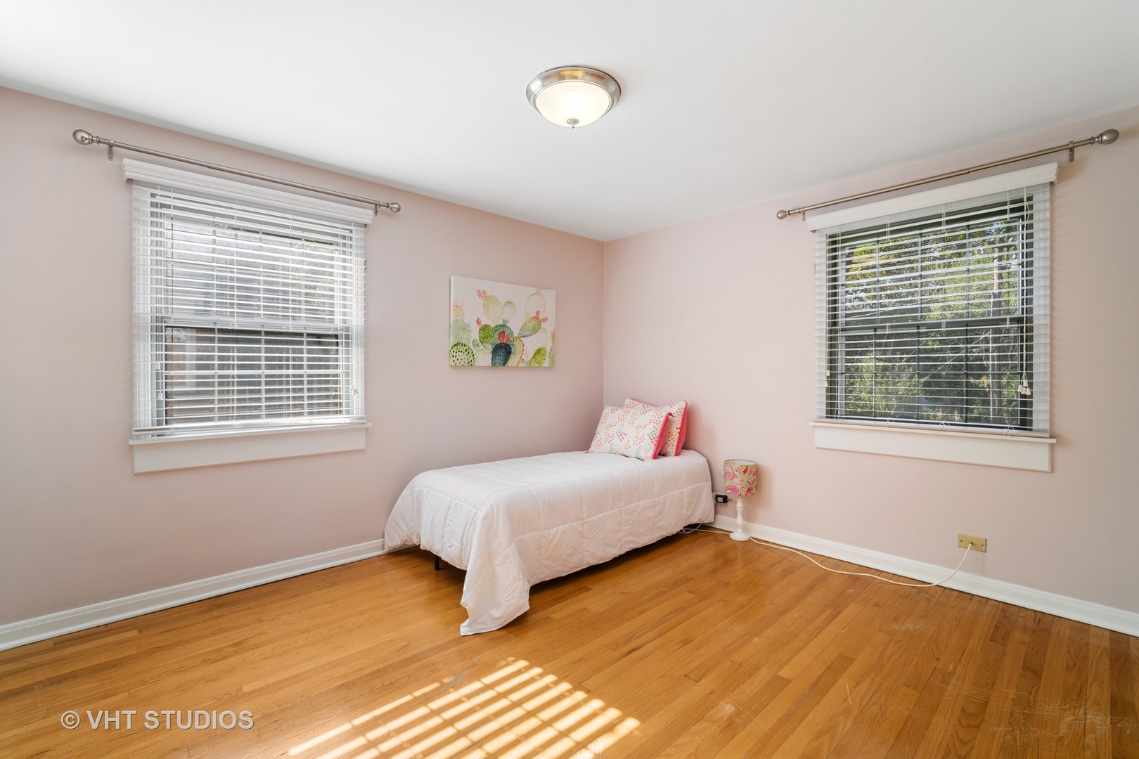 932 Echo Lane Glenview, IL 60025 - Photo 11 of 18 a bedroom with a bed and a window