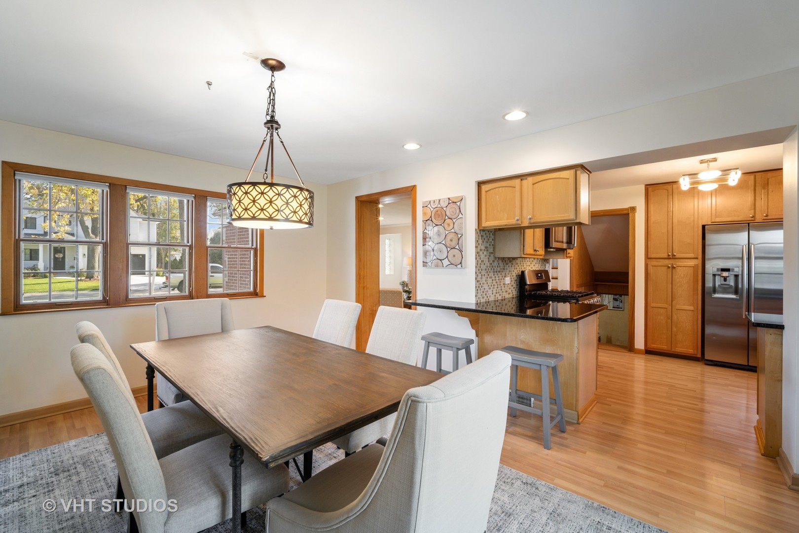 932 Echo Lane Glenview, IL 60025 - Photo 5 of 18 a view of a dining room with furniture window and wooden floor