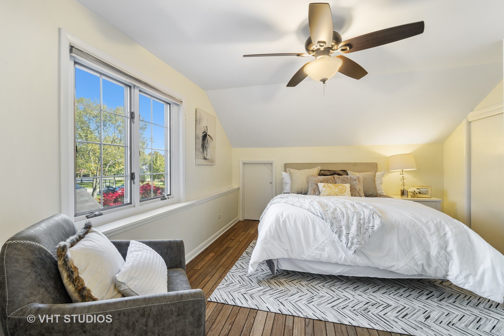 932 Echo Lane Glenview, IL 60025 - Photo 8 of 18 a bedroom with a bed and window