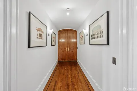 a kitchen with cabinets appliances and a sink