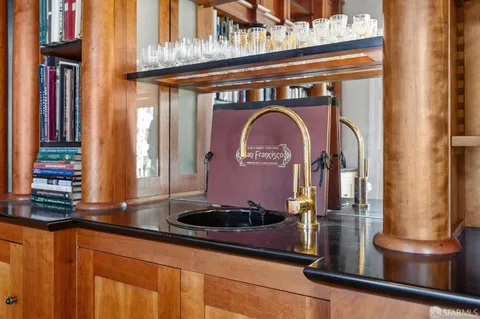 a bathroom with a toilet a sink and shower