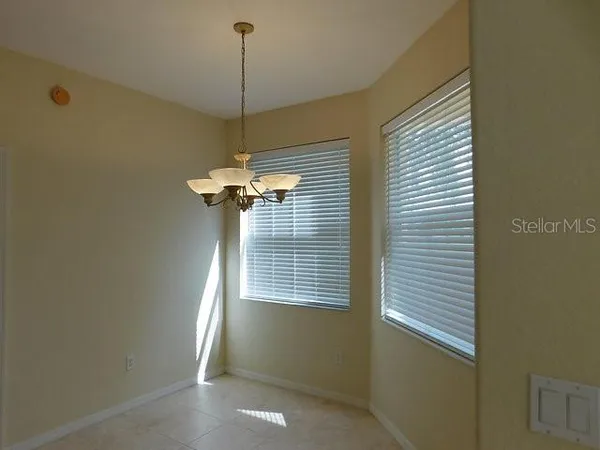a view of a hallway with a window