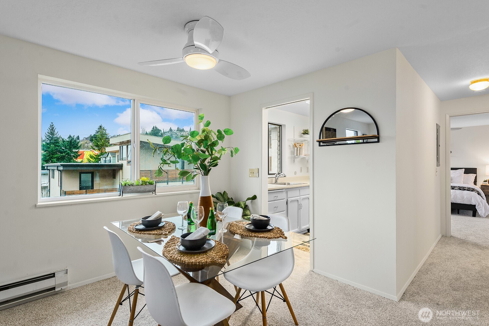 610 Aloha Street, Unit 404 Seattle, WA 98109 - Photo 11 of 23 a view of a dining room with furniture window and outside view