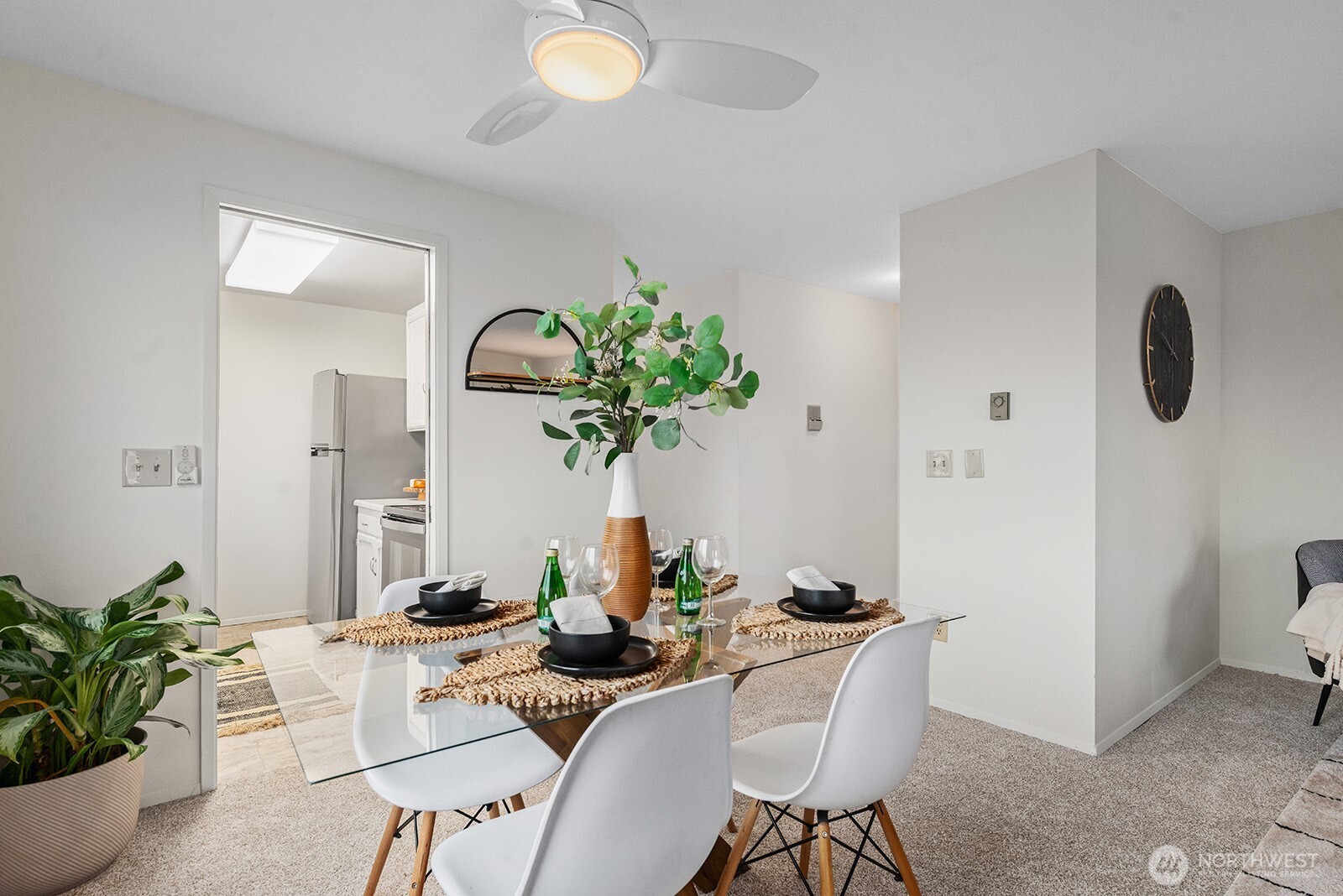 610 Aloha Street, Unit 404 Seattle, WA 98109 - Photo 12 of 23 a view of a dining room with furniture and wooden floor