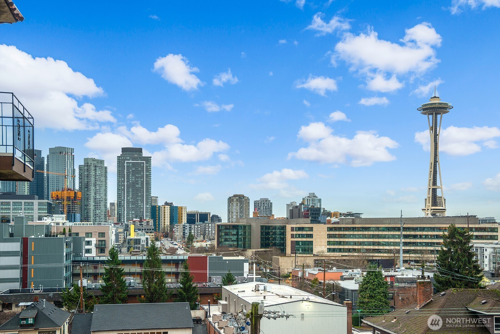 610 Aloha Street, Unit 404 Seattle, WA 98109 - Photo 3 of 23 a view of a city with tall buildings